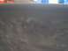 1986 Ford Bronco - The image shows a close-up of a gray painted metal surface, possibly a vehicle panel, with a Supermotors.net watermark visible in the lower…